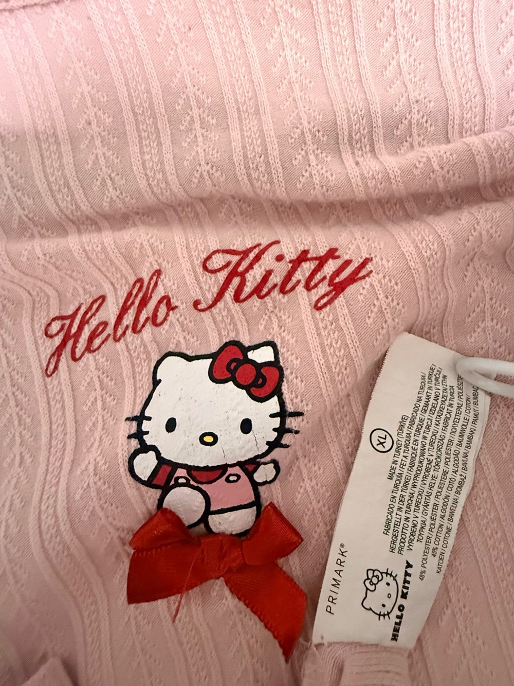 Primark Pink Hello Kitty Pajama Top with Red Bow